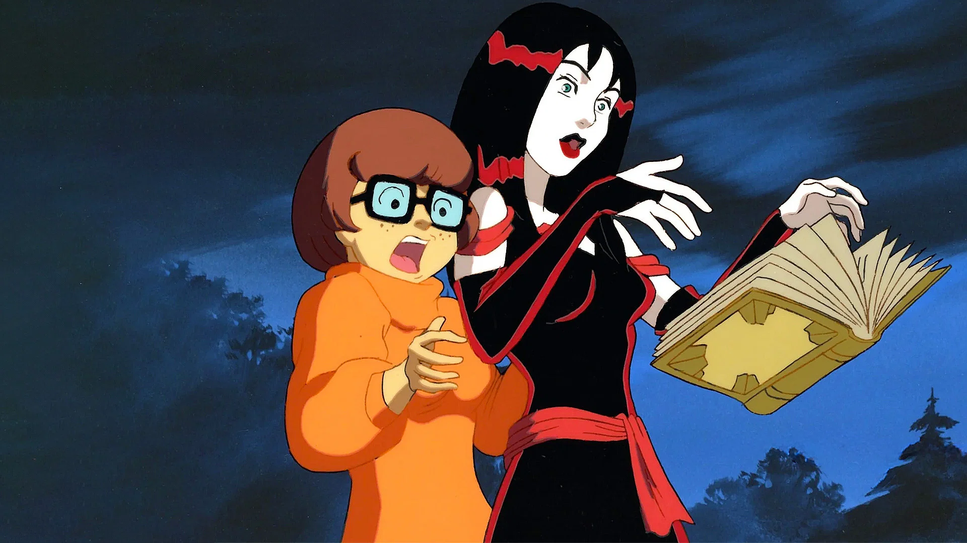 Velma watches as one of the Hex Girls reads from a floating spellbook.