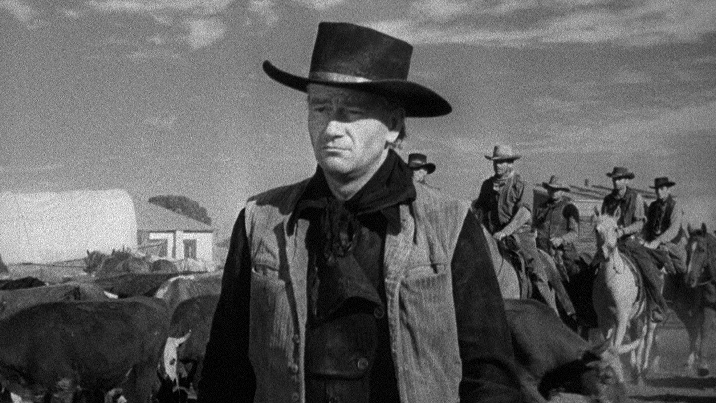 John Wayne gives a stern look in Red River.