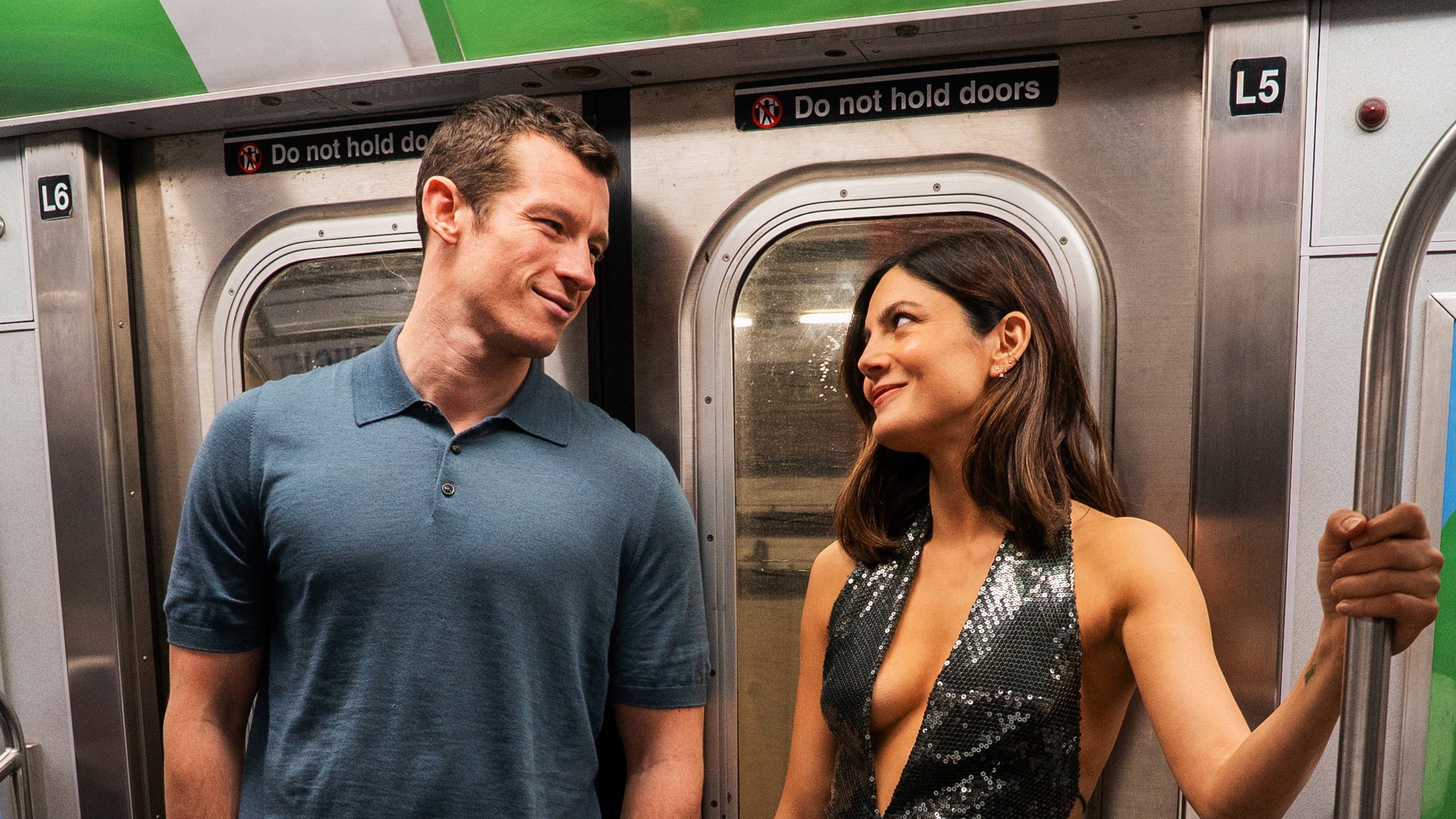 Monica Barbaro and Callum Turner take the subway in One Night Only